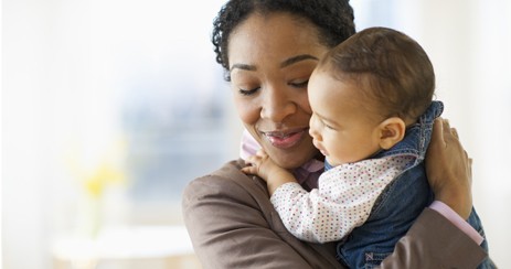 Parent holding an infant